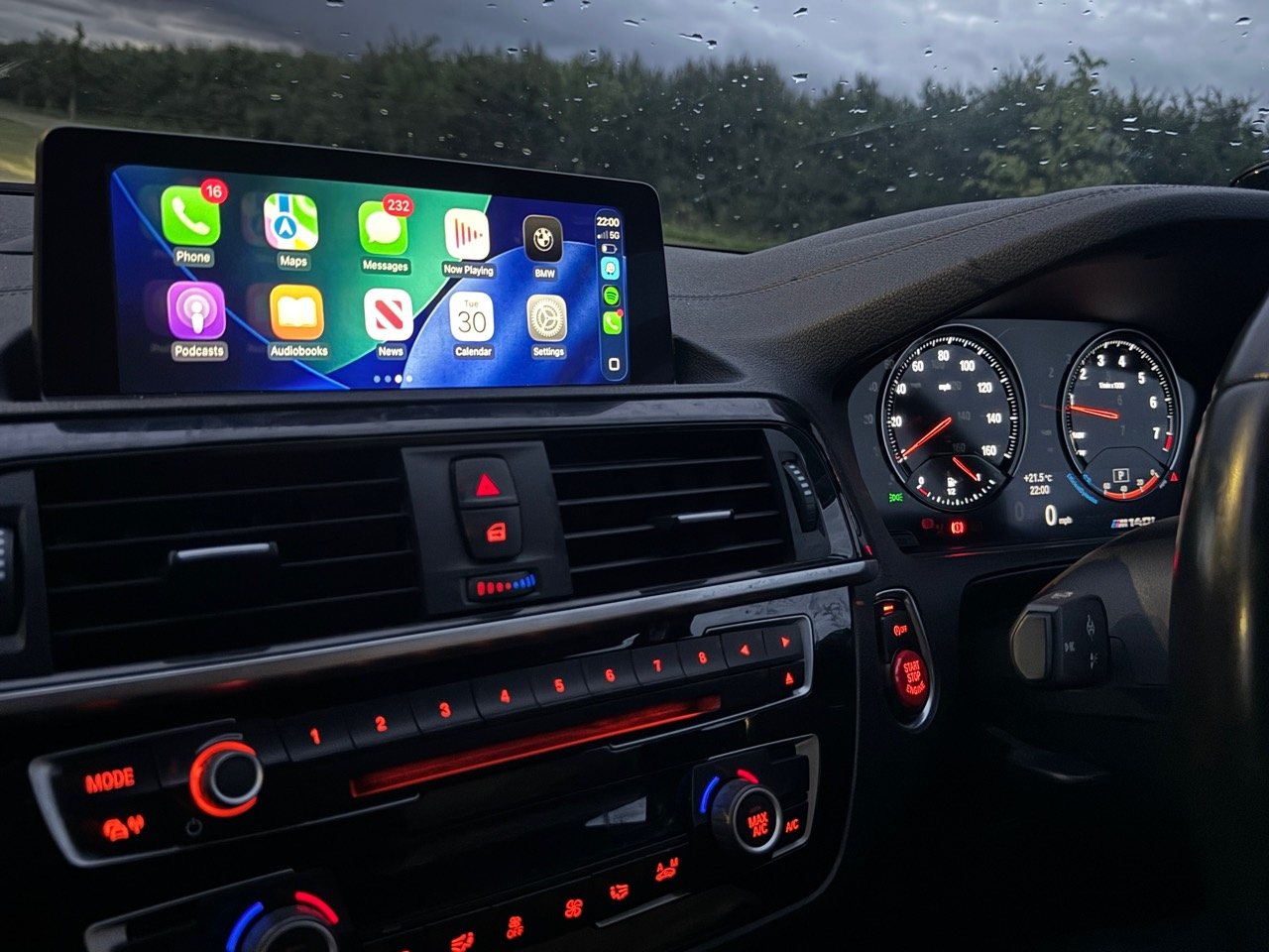 Real BMW dashboard with Apple CarPlay active