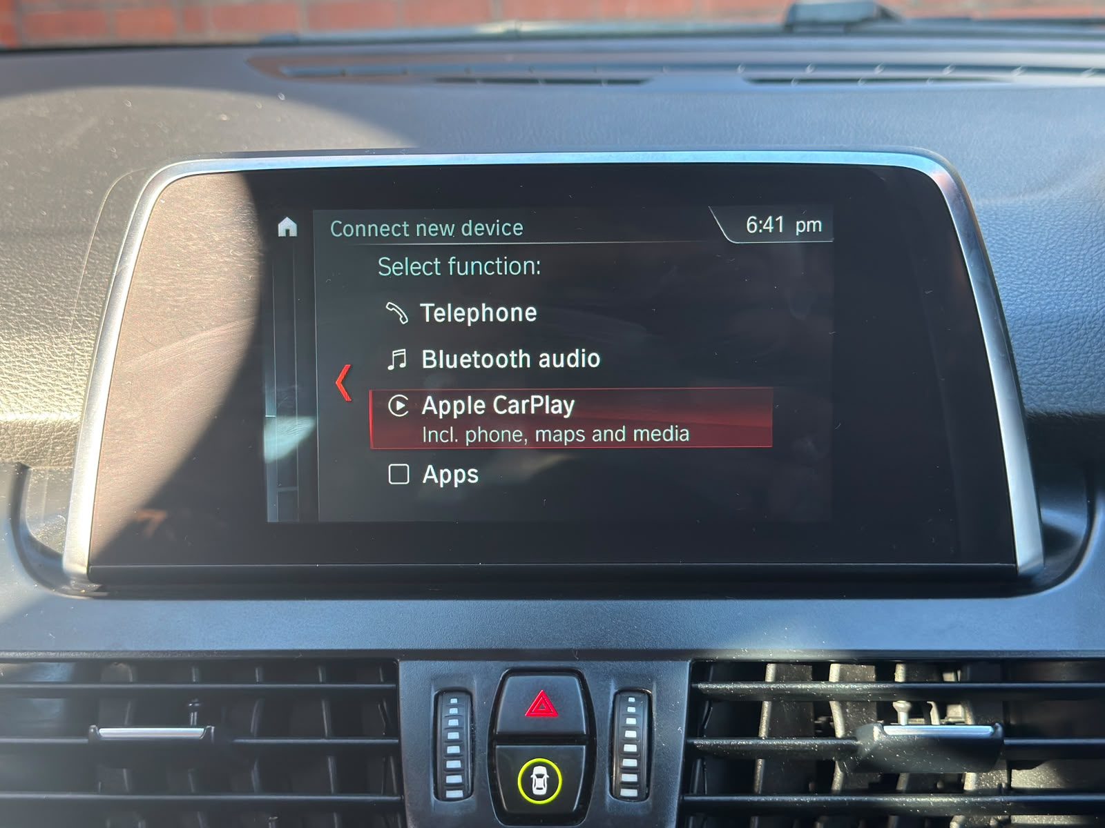 BMW F46 iDrive menu showing Apple CarPlay option enabled