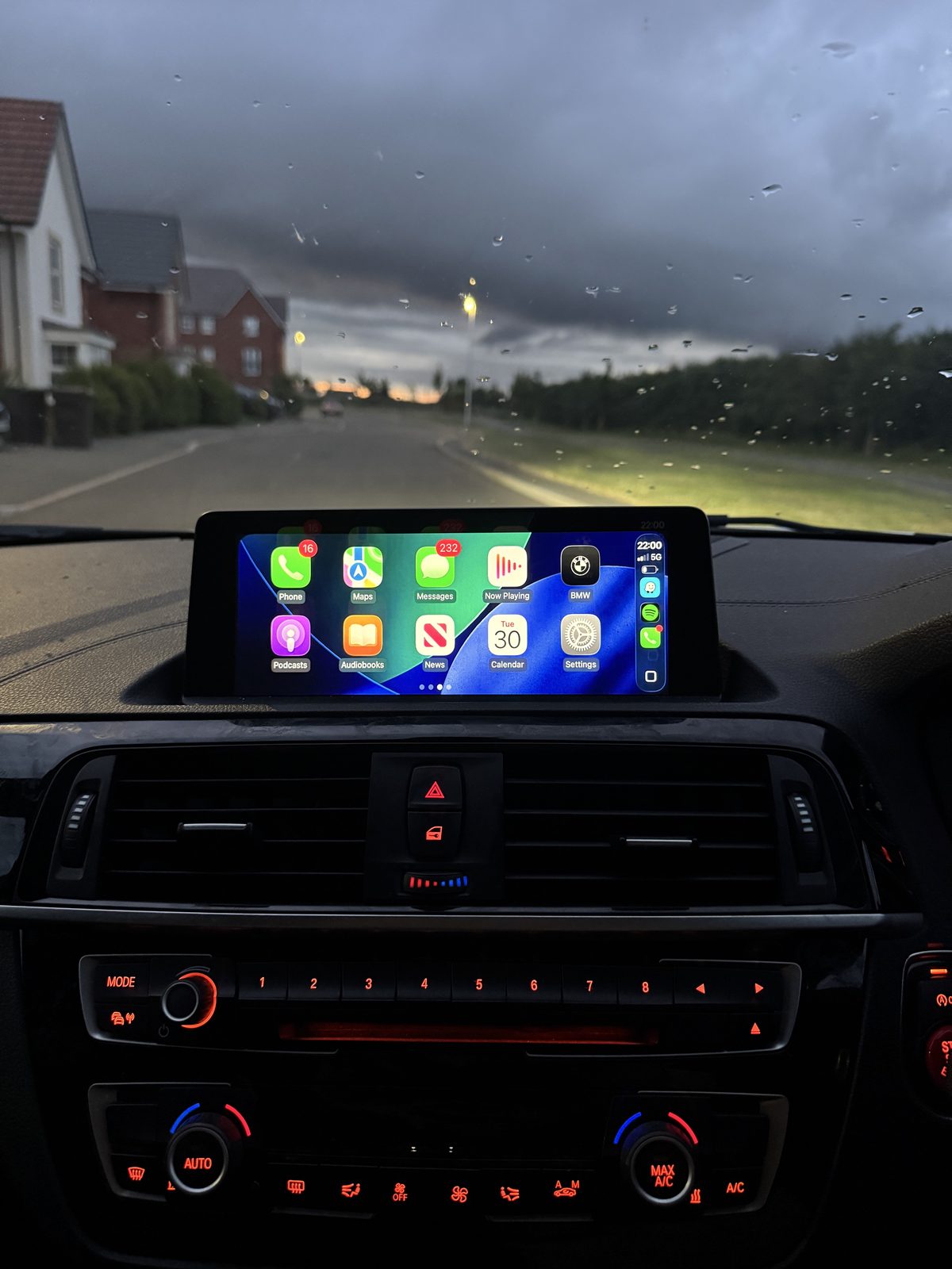 BMW M140i Stage 2 dashboard with Apple CarPlay active after coding